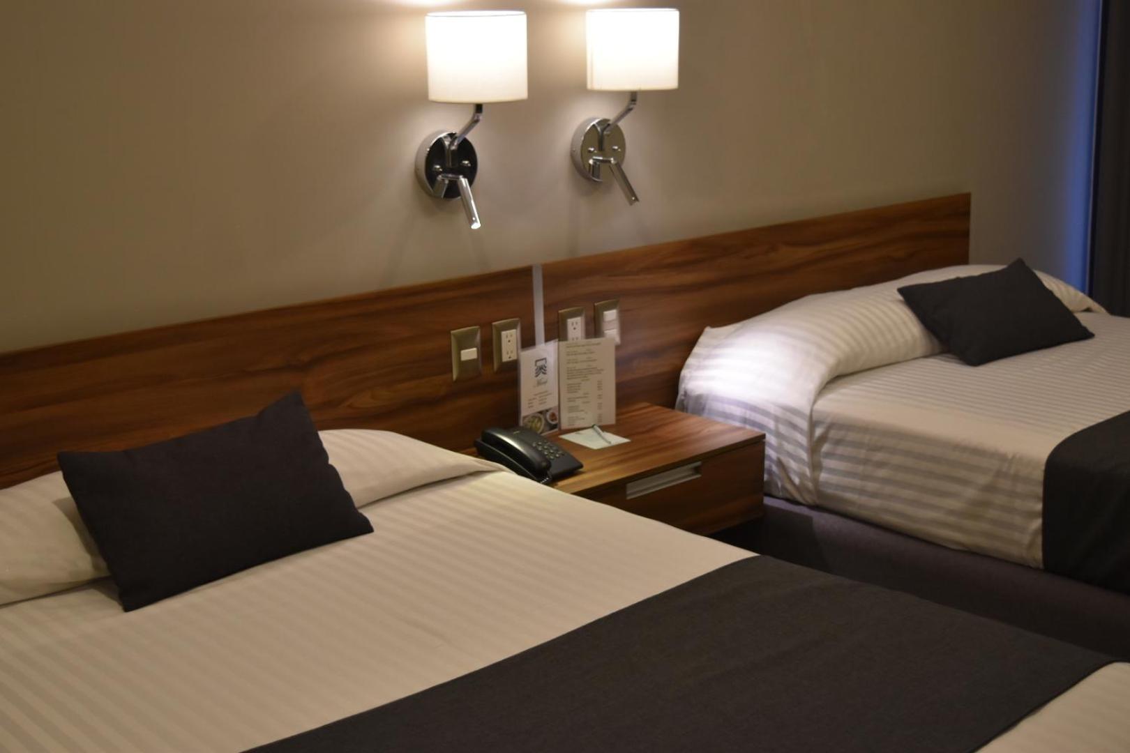 Estanza Hotel&Suites Morelia Habitación foto
